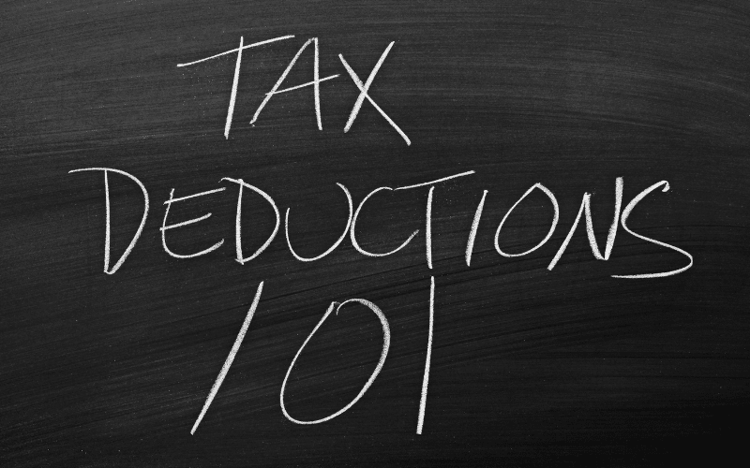 Chalkboard that says "Tax Deductions 101"