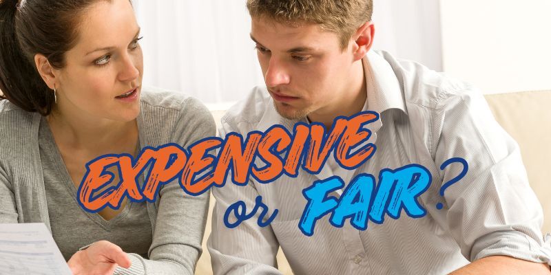 Couple looking at bill says: Expensive or Fair?