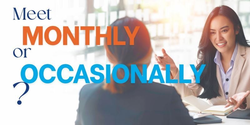 Woman meeting with accountant says: Meet Monthly or Occasionally?