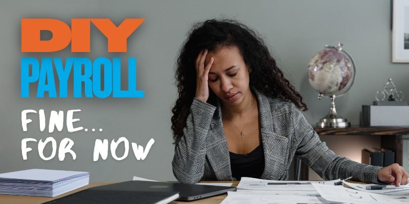 woman with head in her hand, surrounded by papers at a desk with text 